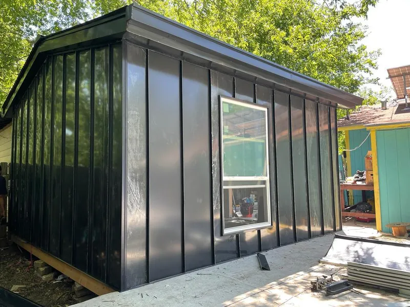 Black standing seam metal wall panels for Roof Inspection in Sedalia