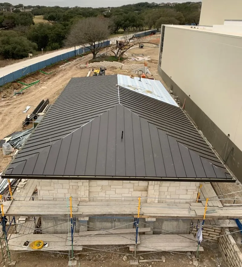 Metal roof new construction with scaffolding in Sedalia